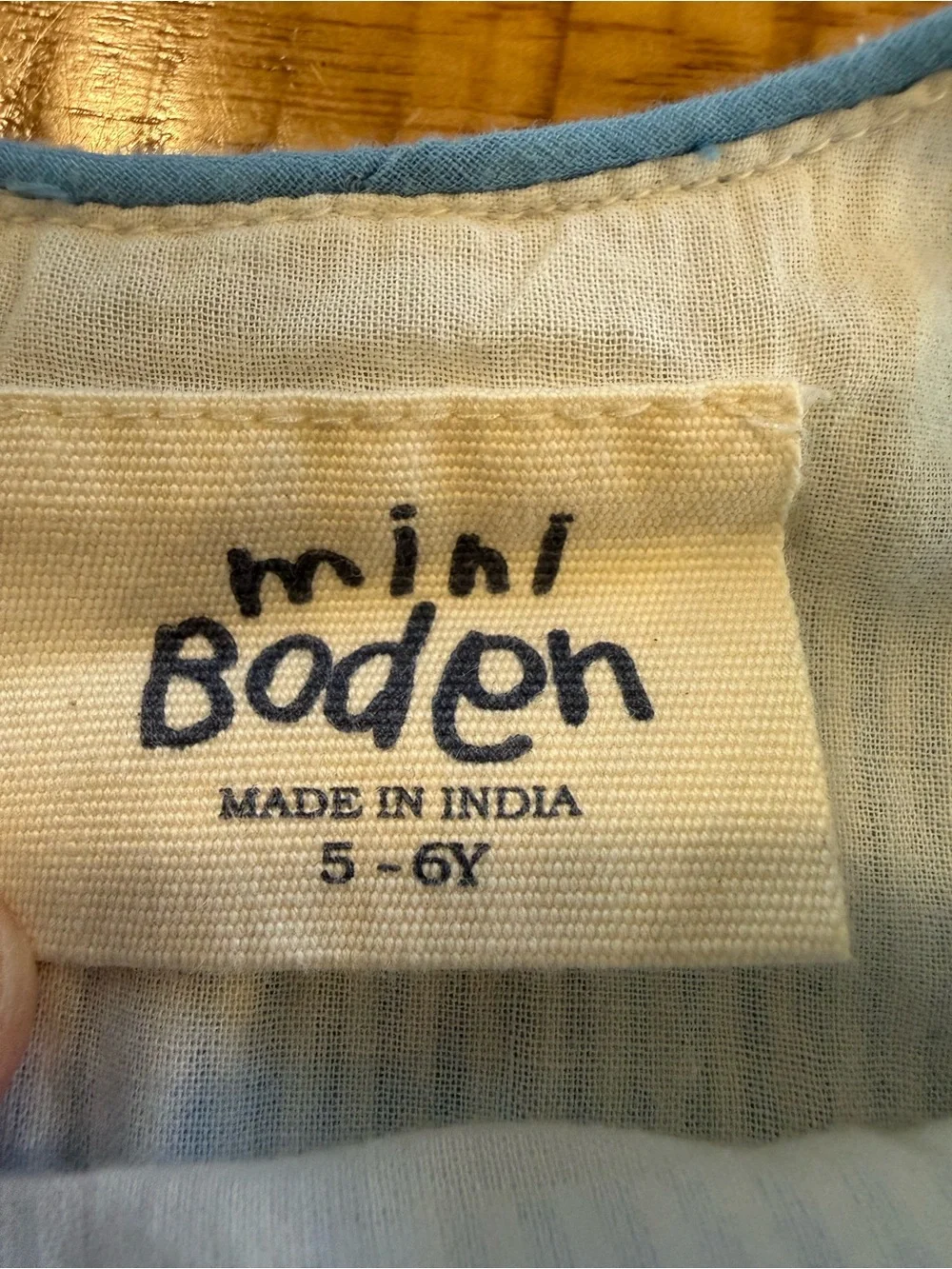 Mini Boden seersucker dress with flower appliqué